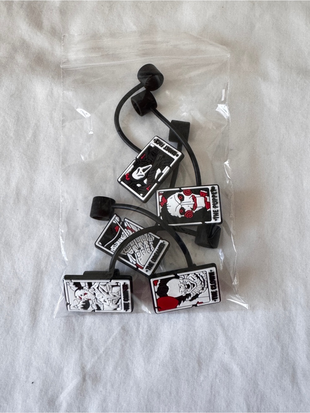Black Novelty Wired Earbuds with Horror Card Charms